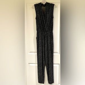 Women’s sleeveless jumpsuit with pockets, size small